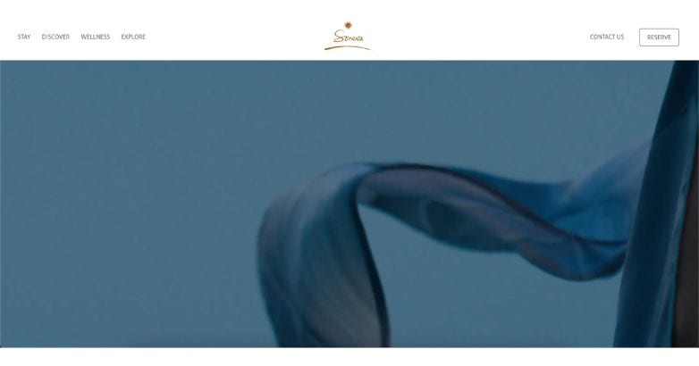 Soneva website displaying minimalist design with focus on wellness and natural aesthetics