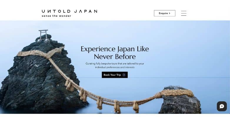 Untold Japan's luxury travel website design, offering bespoke experiences with an iconic torii on a rugged islet