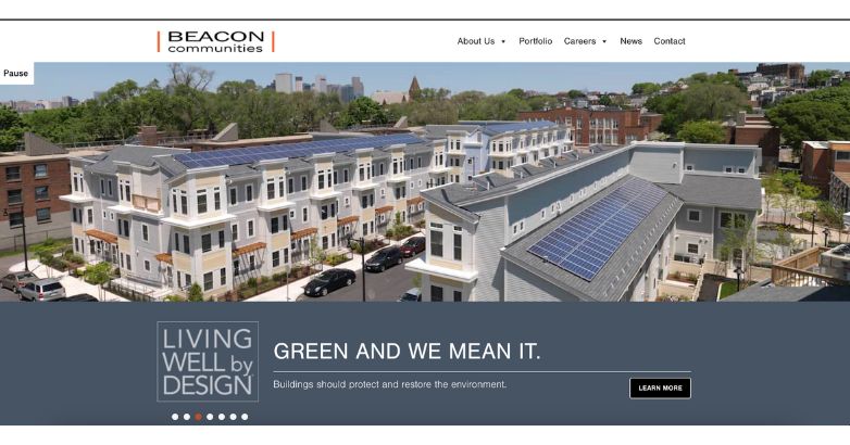 Eco-friendly Beacon Communities residential development featuring solar-paneled roofs, promoting sustainable living in urban settings.