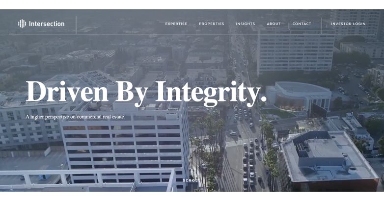 Intersection's website header featuring a bird's-eye view of a cityscape, highlighting their commercial real estate insight