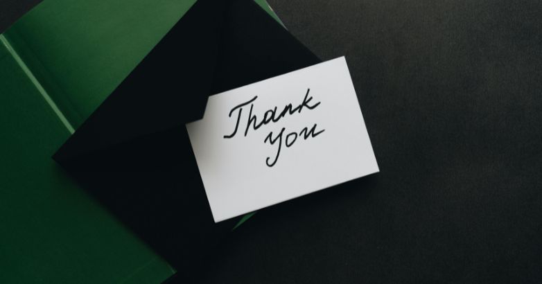 The tourist received a thank you card for staying at the hotel