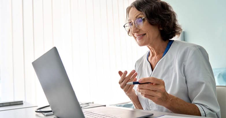Medspa specialist talking to her client via online.