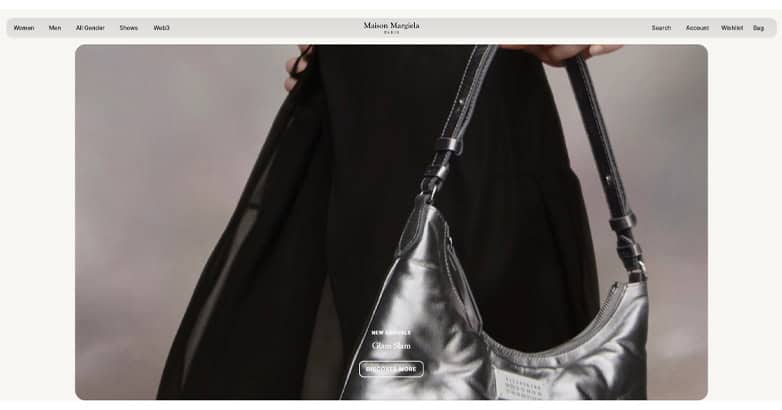 The Maison Margiela website highlights close-up image of luxurious handbag with minimalist aesthetic web design