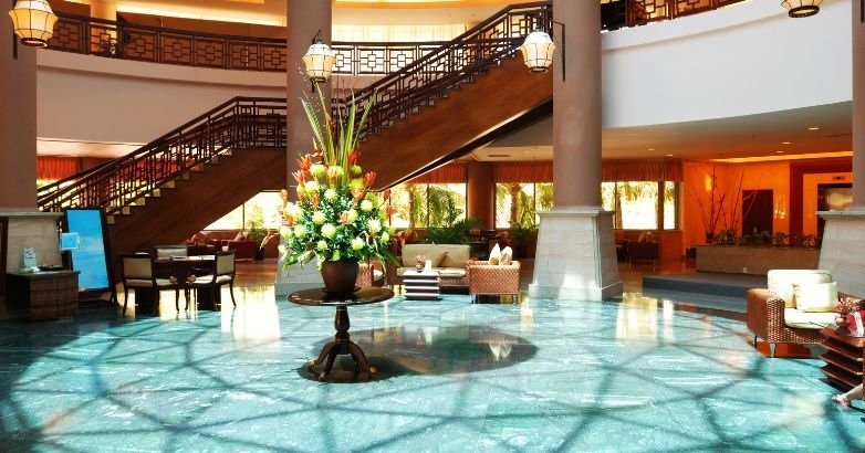Luxury hotel lobby interior highlighting the importance of advertising for direct bookings